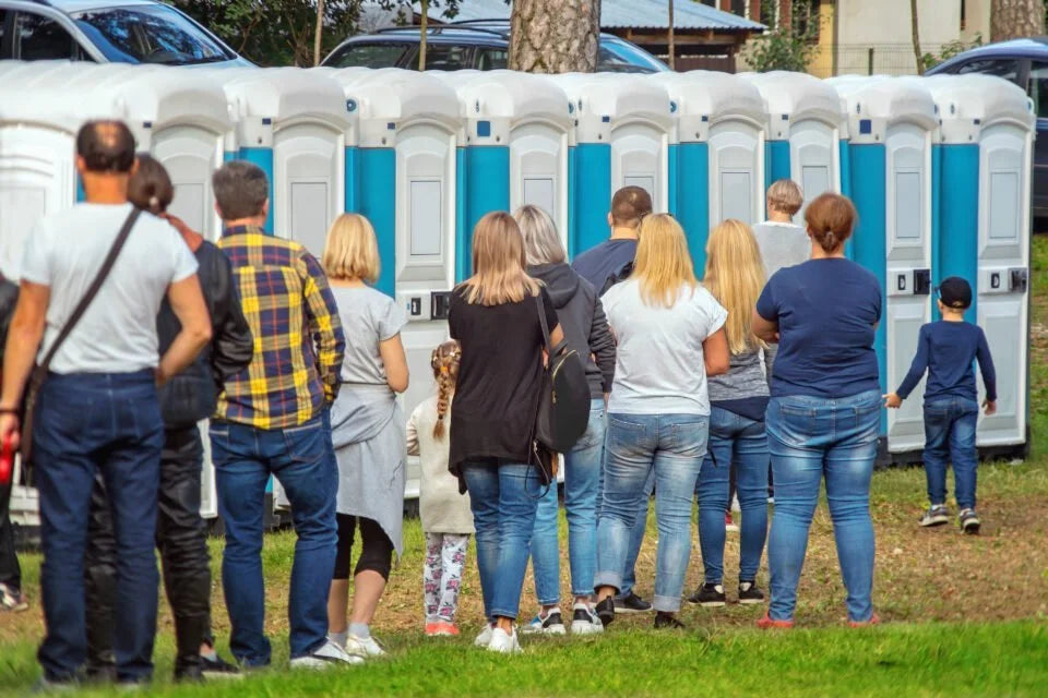 queue for chemical toilets